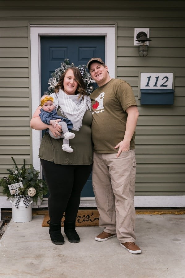 Man and woman holding their baby who was just released from the neonatal intensive care unit at Kelowna General Hospital 