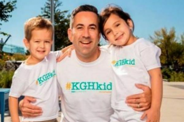 Kelowna Mayor, Colin Basran, outside with two children, all wearing #KGHKid shirts